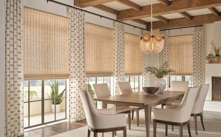 naturally woven shades in modern farmhouse dining room with exposed beams